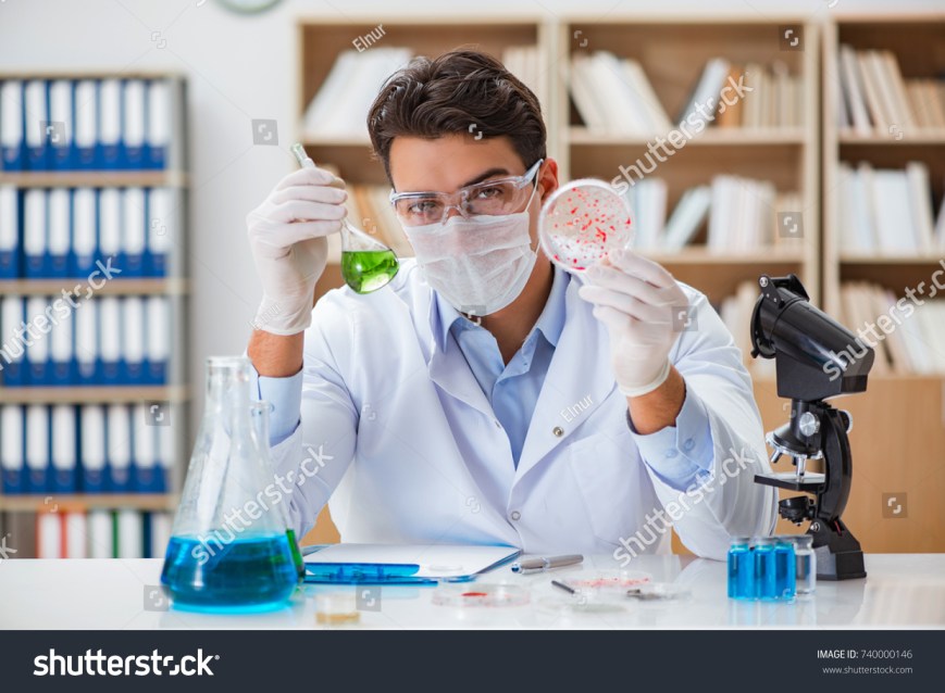 stock-photo-male-doctor-working-in-the-lab-on-virus-vaccine-740000146